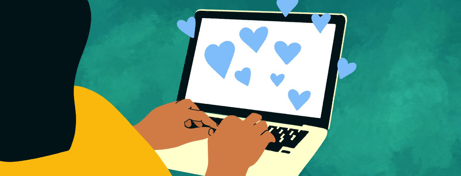 Adult female types at a computer while hearts appear on the screen