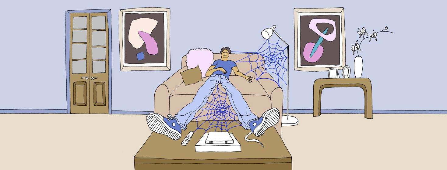 a man has a lack of motivation on the couch where spider webs form on his body