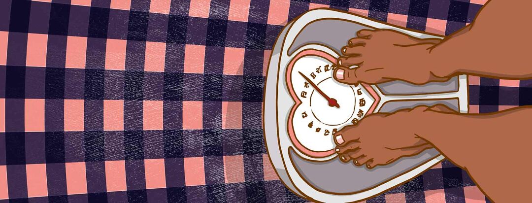 feet on a scale with a heart shaped dial